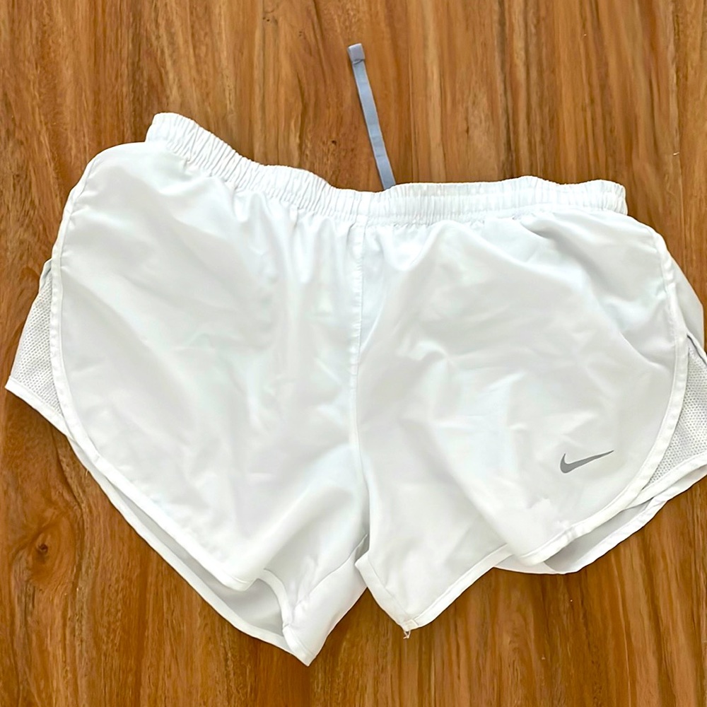 Nike Dri-Fit white small shorts.